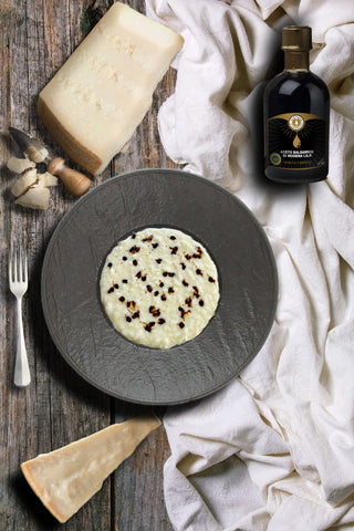 Risotto cremoso al parmigiano e aceto balsamico di Modena IGP