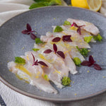 Piatto con cruditè di pesce con olio al limone- Nostrale Gourmet