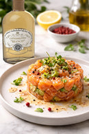 Tartare di salmone e avocado condita con condimento bianco Acetaia Castelli