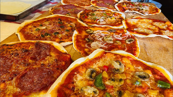 pizze sottili artigianali condite
