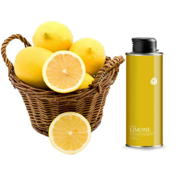 Lemon flavored olive oil 250ml tin and fresh lemons in basket, Nostrale Gourmet product.