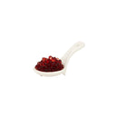 Italian raspberry pearls on white ceramic spoon, Nostrale Gourmet artisanal condiment